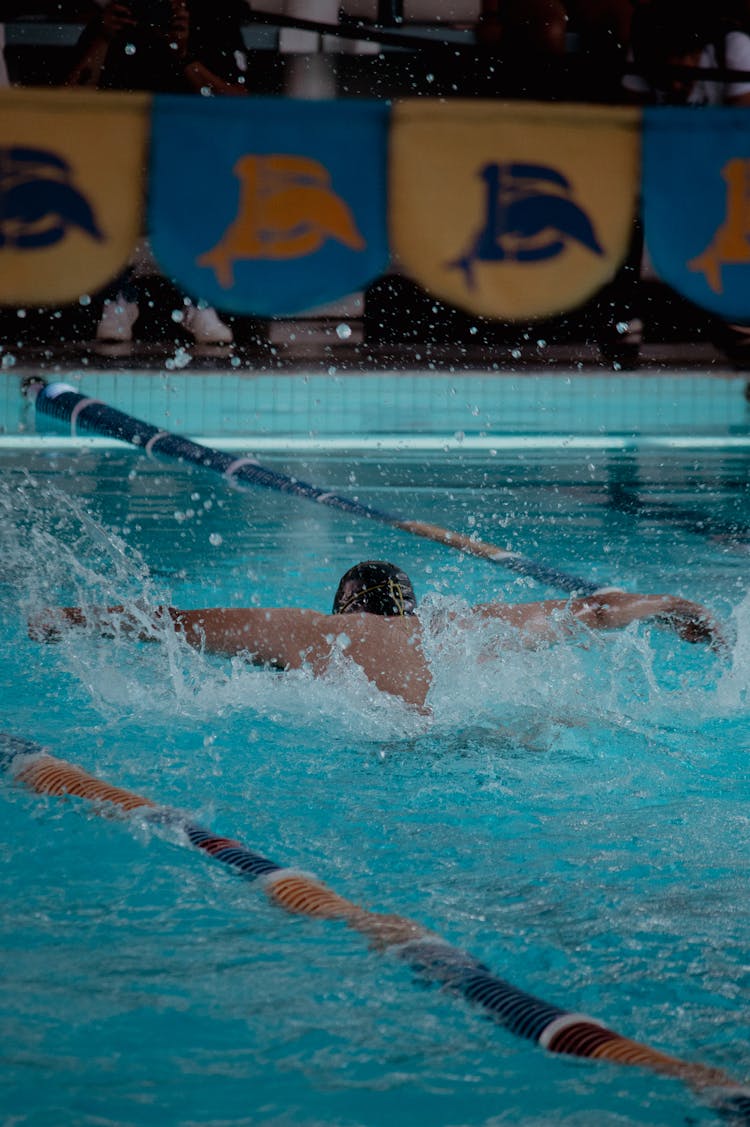 A Man Doing The Butterfly Stroke