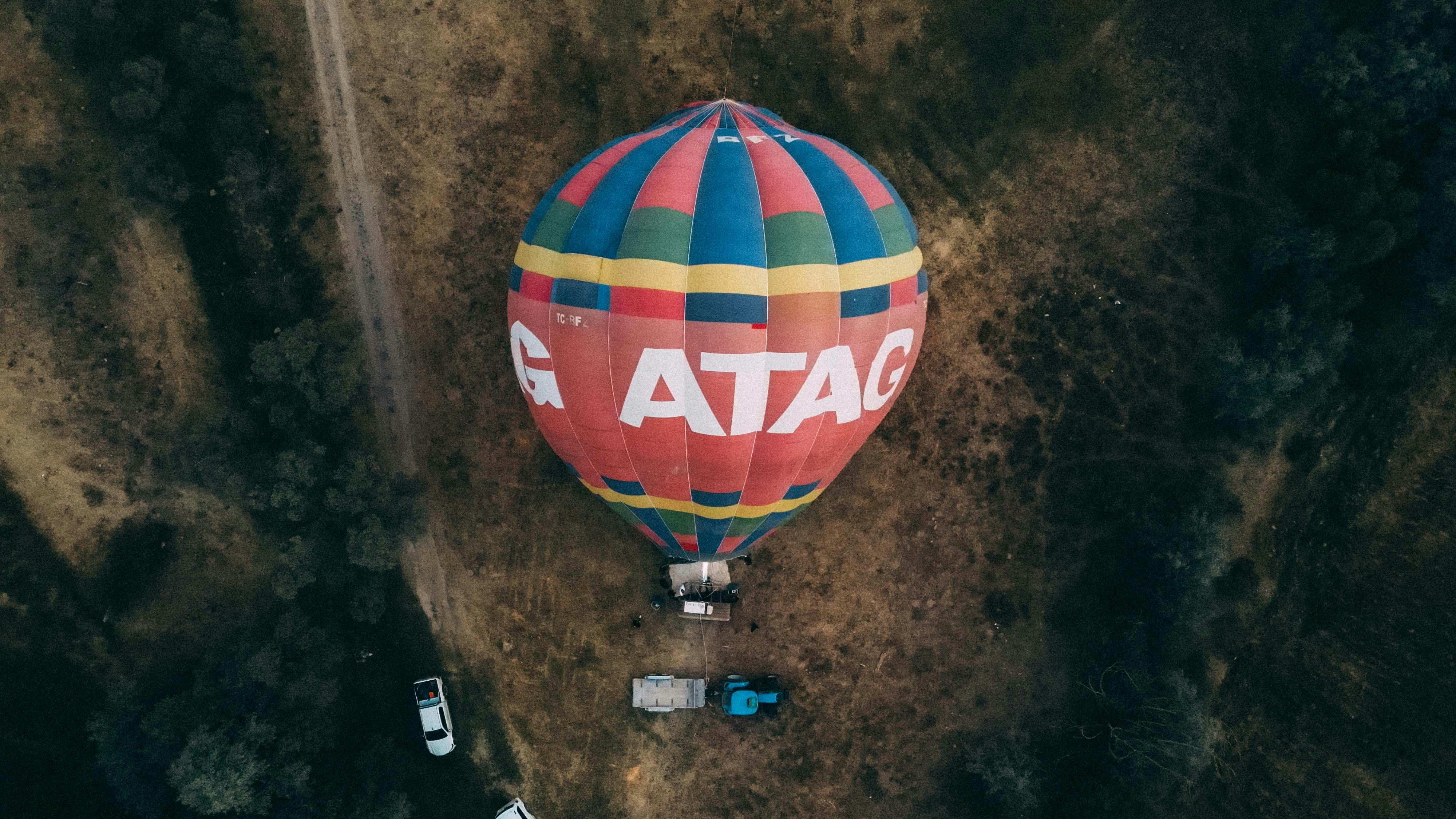 Hot Air Balloon on Field · Free Stock Photo