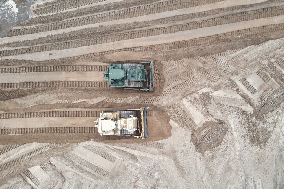 heavy grading equipment on a rural driveway heavy grading equipment on a rural driveway