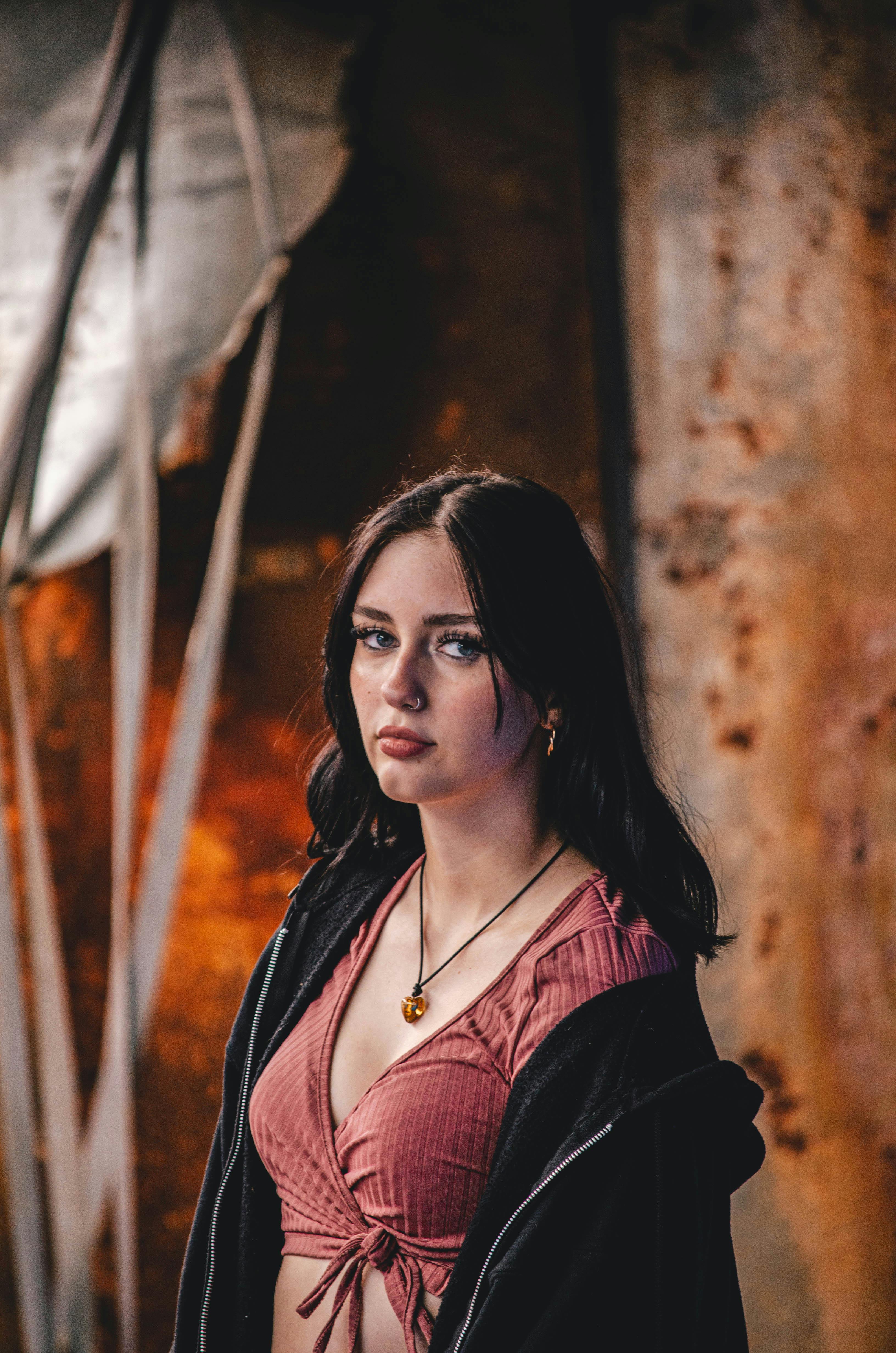  Woman in Black Leather Jacket With Tattoo on Neck · Free Stock Photo