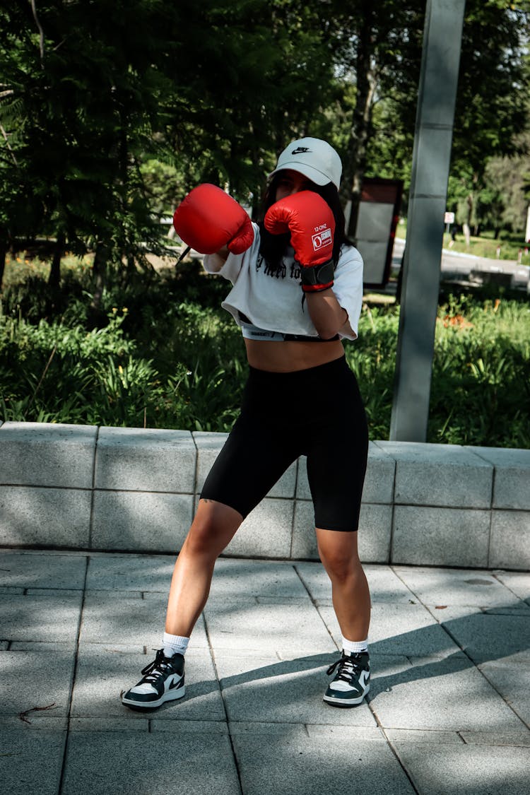 Woman In Active Wear With Boxing Gloves