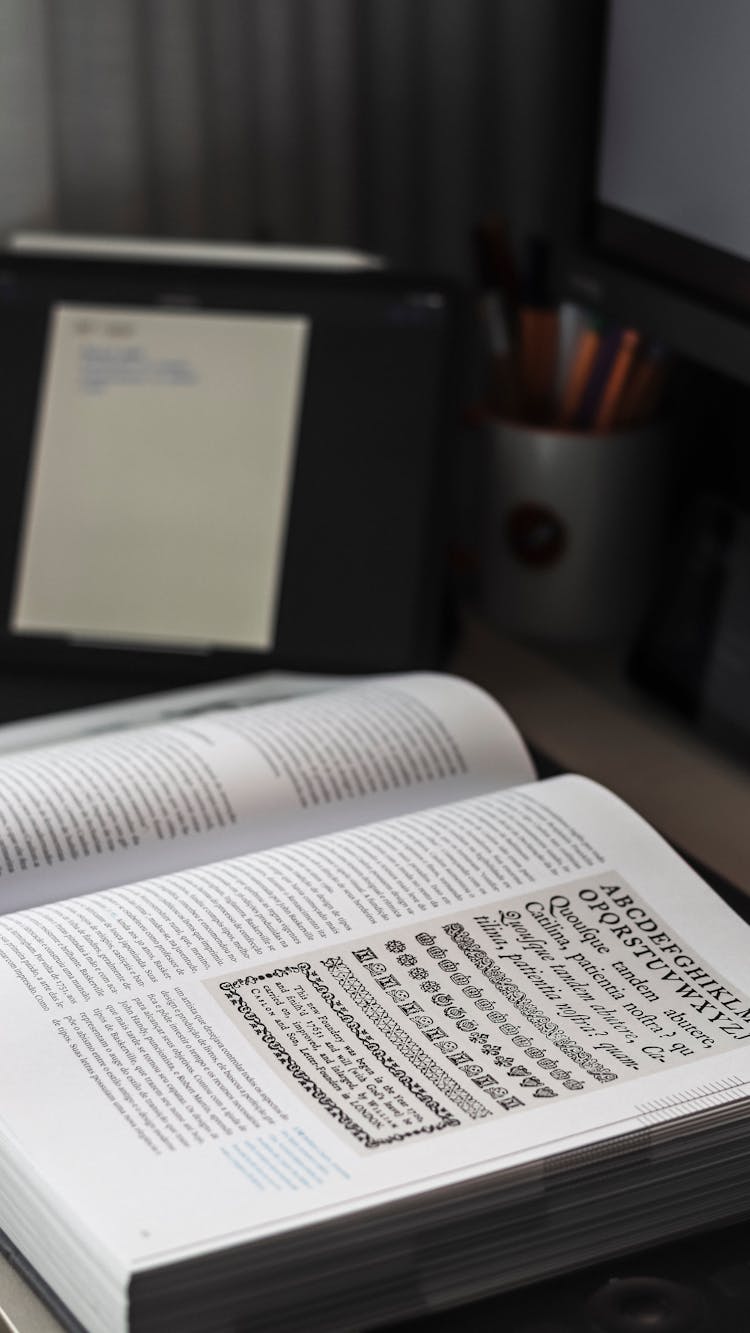 Close-up Of A Book On A Desk