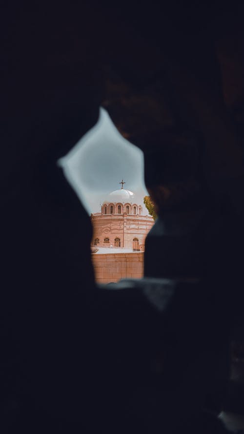 Church of St. George in Cairo, Egypt Seen Through Hole in Wall