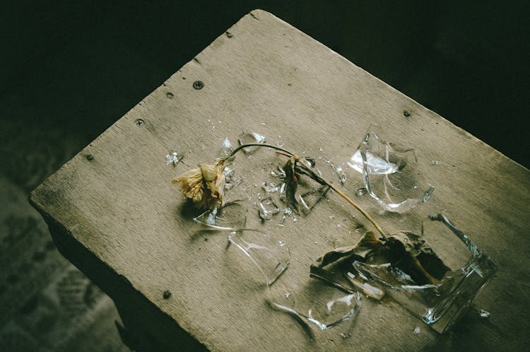 Top View Of A Broken Vase On A Wood