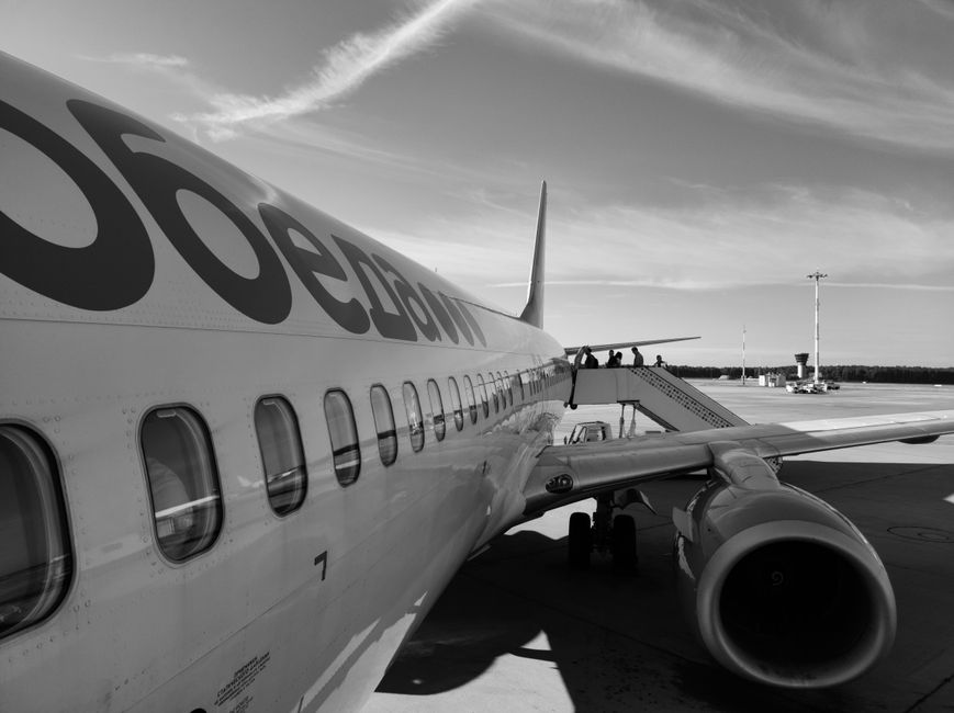 Aegean Airlines aircraft on a runway at a Greek airport