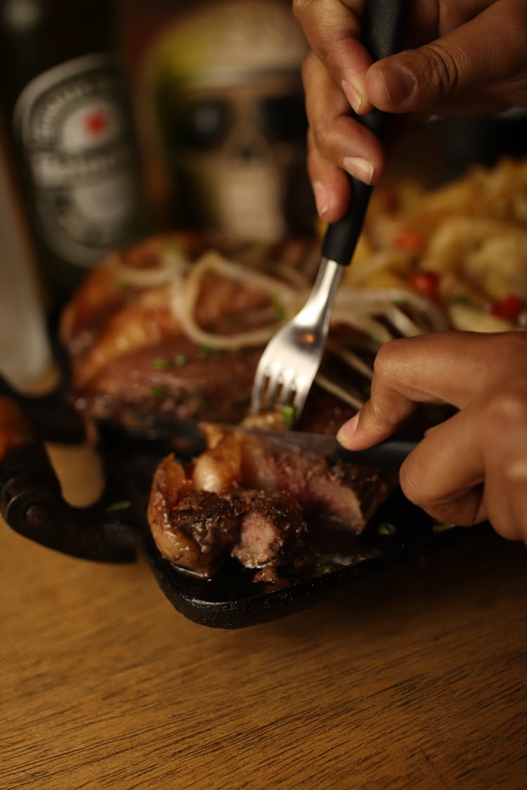 Close Up Of Cutting Meat