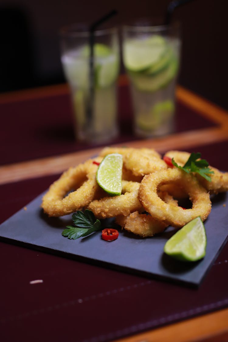 Fried Squid, Limes And Glasses With Lemonade