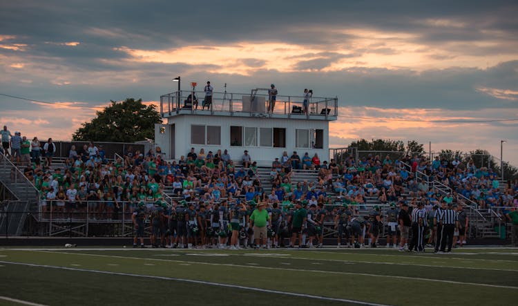 American Football Pitch, A Team And Fans