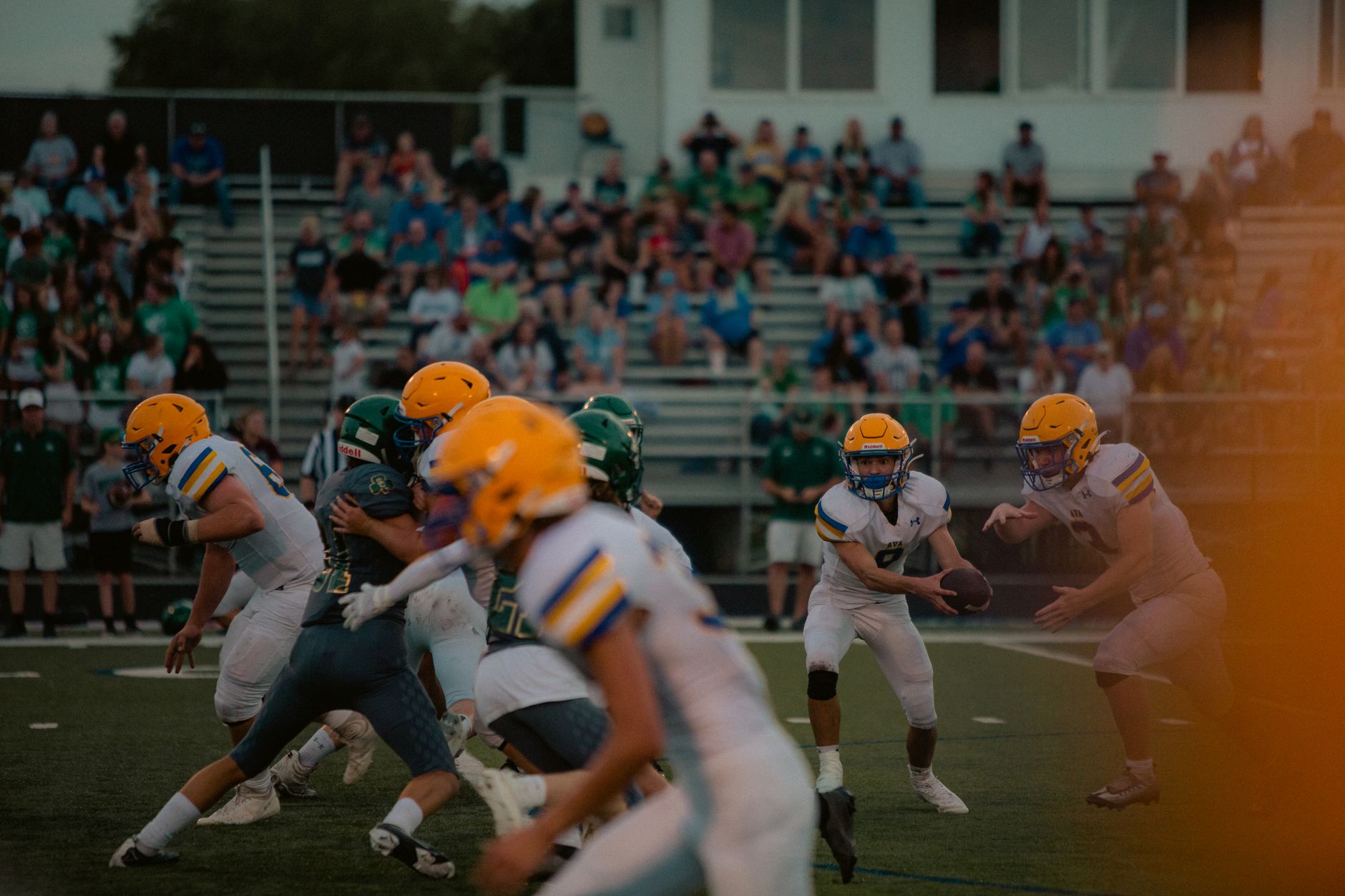 Dynamic capture of football players in action on the field during a competitive game.