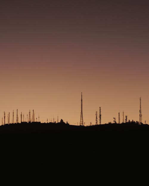 Silhouette of Towers during Sunset
