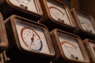 Shallow Focus Photography of Analog Meters