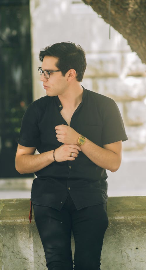 Stylish Man in Black Button Up Polo and Pants