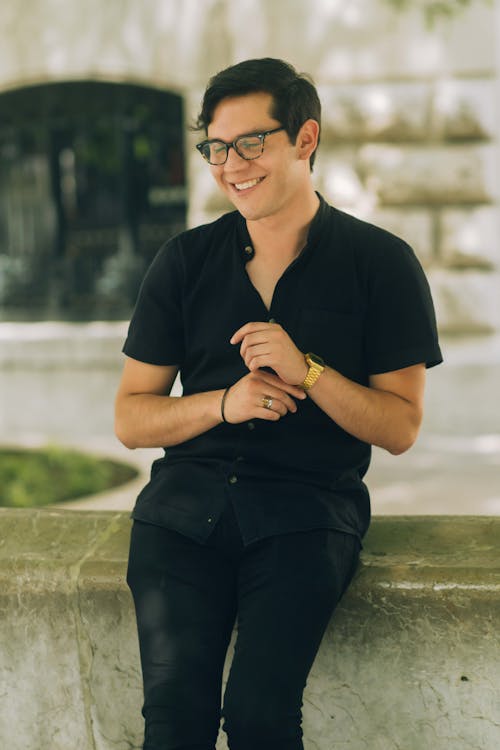 Stylish Man in Black Button Up Polo and Pants
