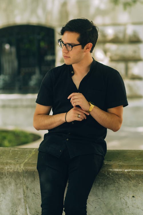 Stylish Man in Black Button Up Polo and Pants
