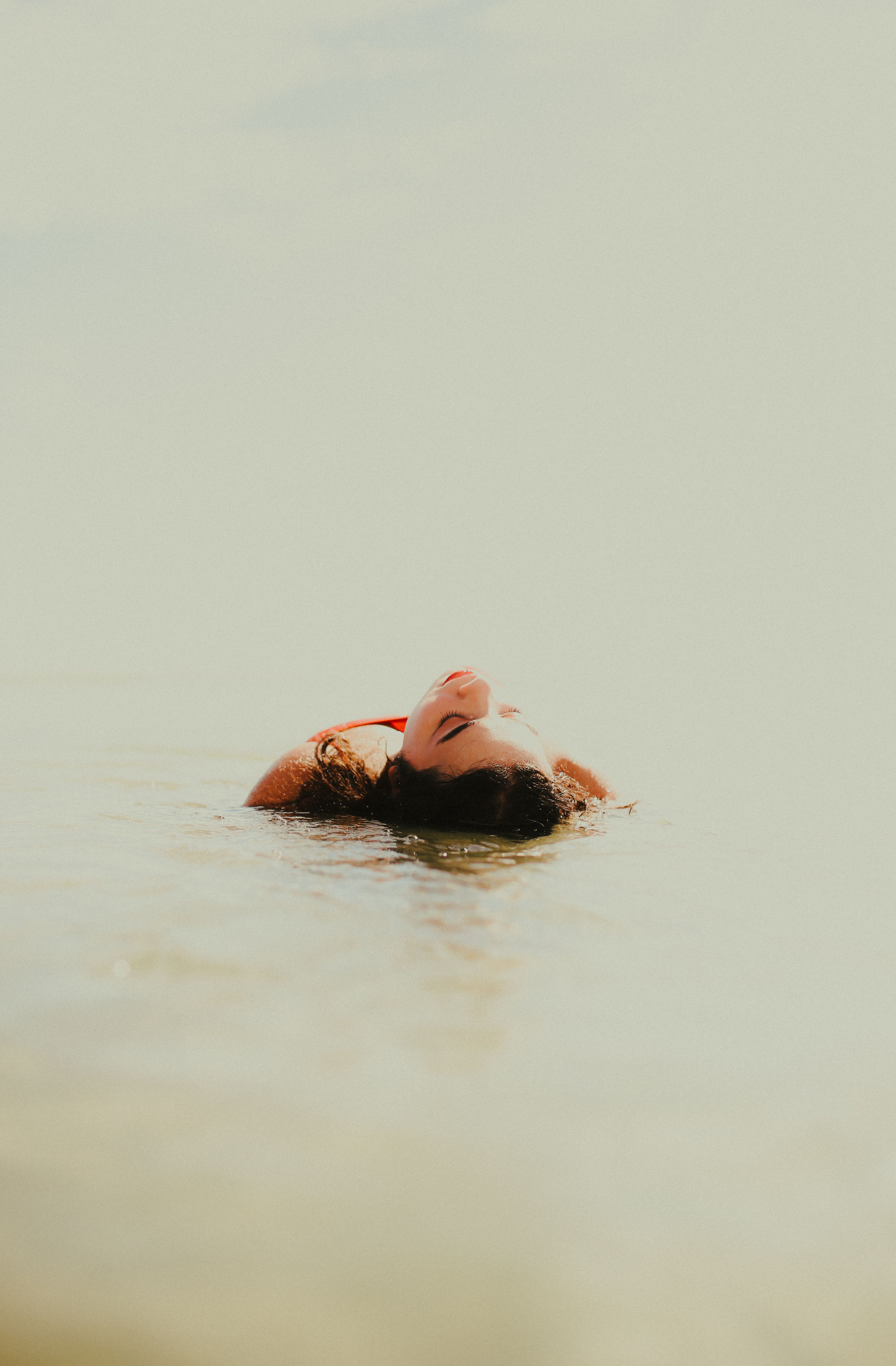 Woman Lying in Water · Free Stock Photo