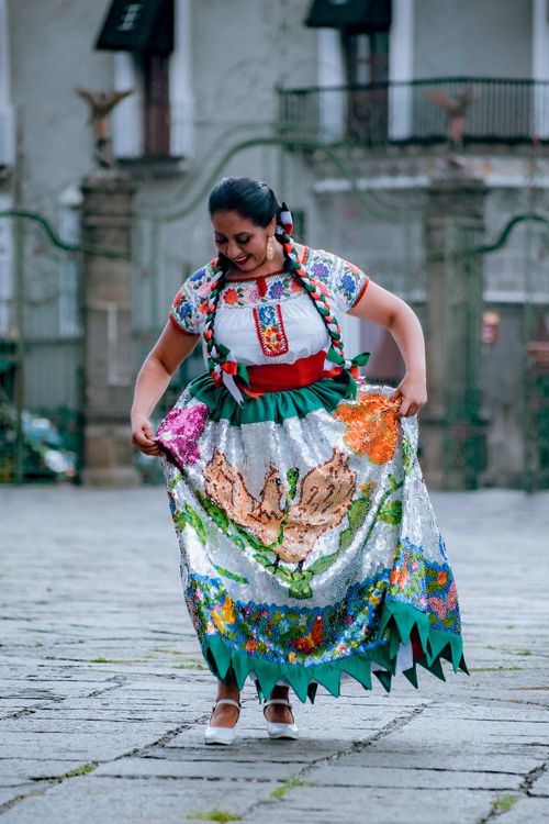 Free Mexican woman in traditional dress celebrating heritage in Puebla, Mexico. Stock Photo