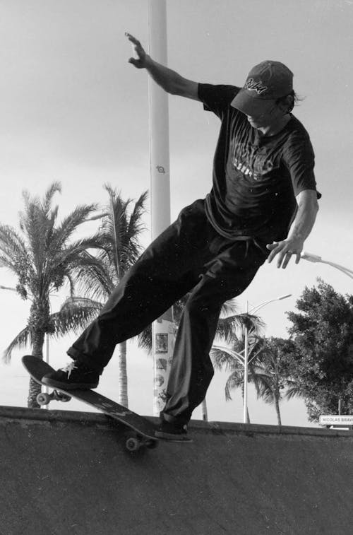 Grayscale Photo of a Skater 