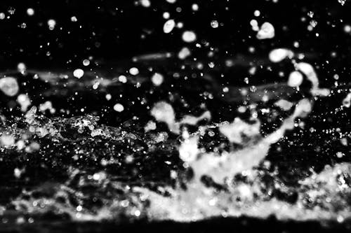 Grayscale Photo of a Splash of Water 