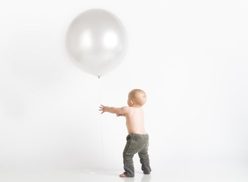 Free stock photo of baby balloon, cute baby