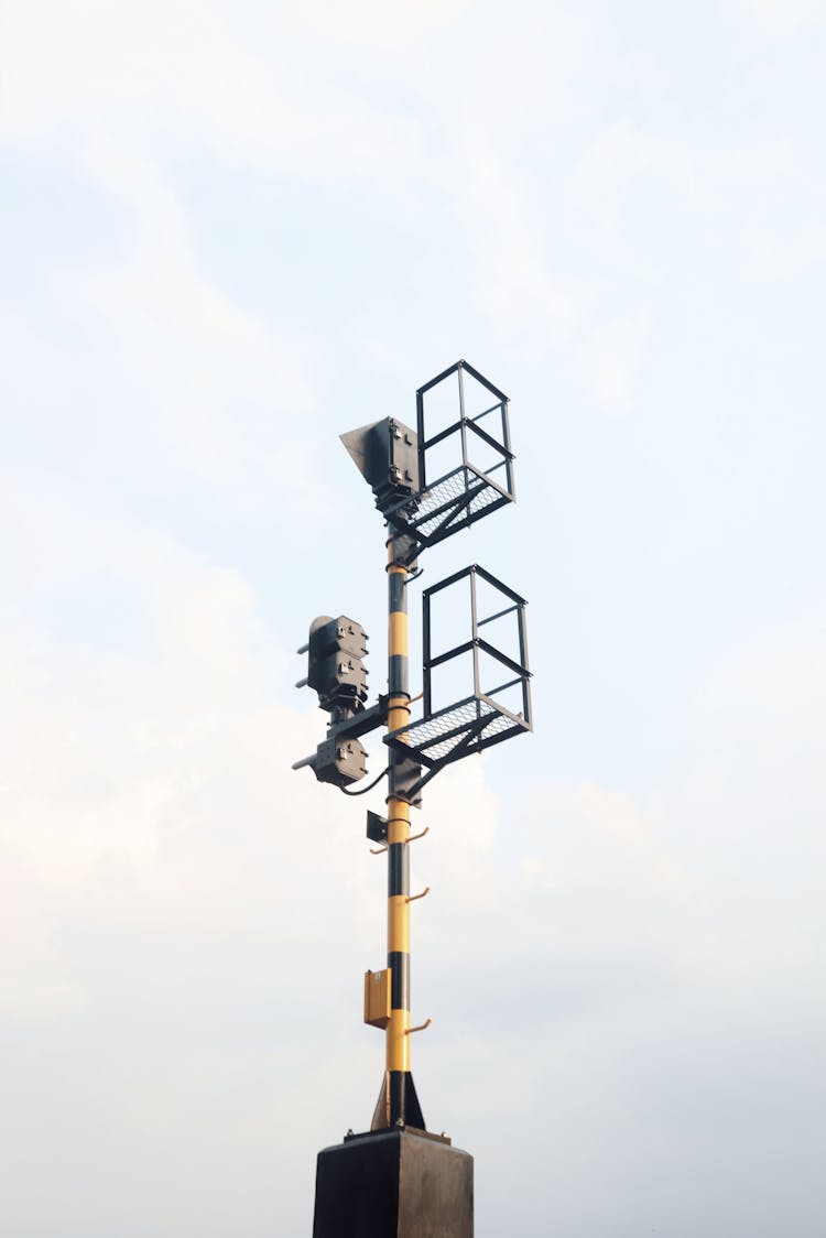 Lamppost On Blue Sky Background