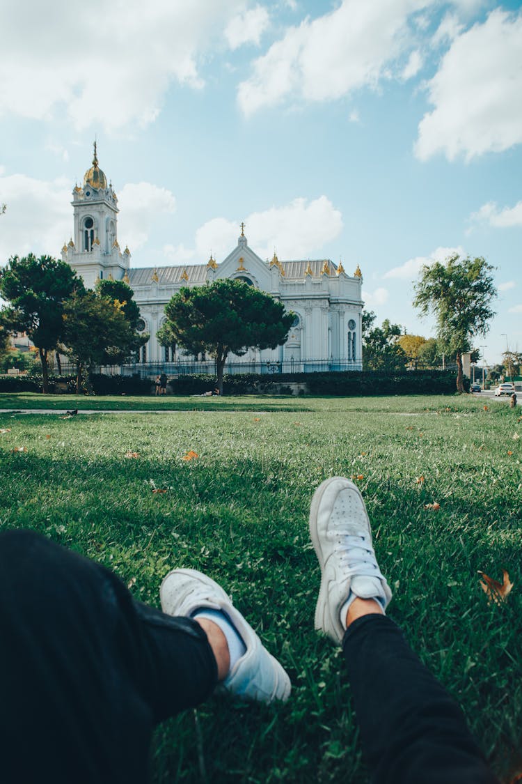 Person Wearing White Sneakers