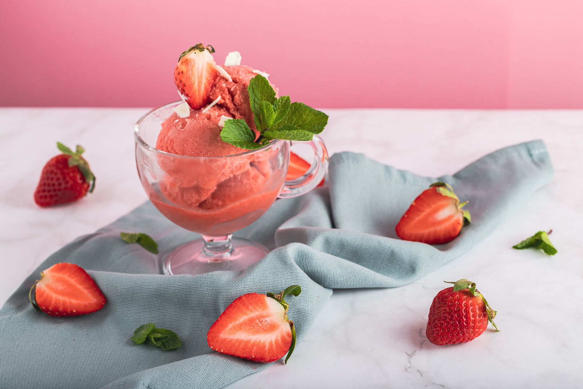 No-churn ice cream scoops with berry coulis drizzle