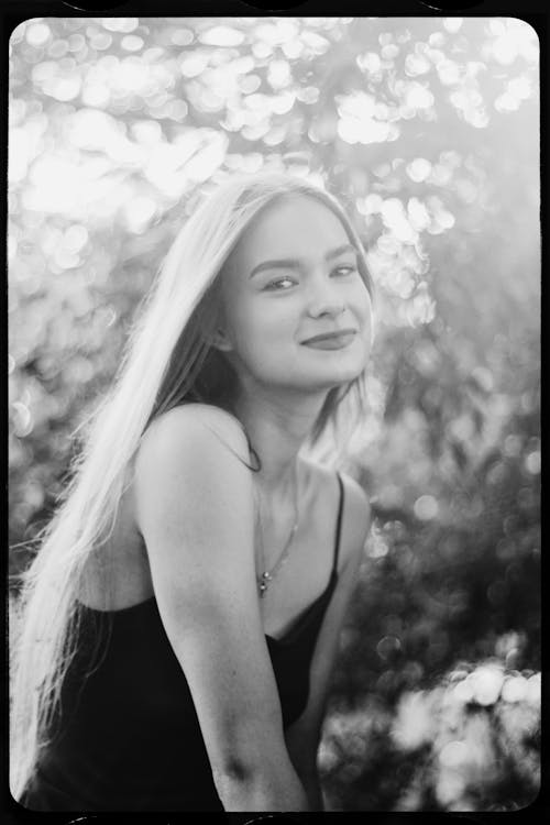 Portrait of Smiling Woman in Park