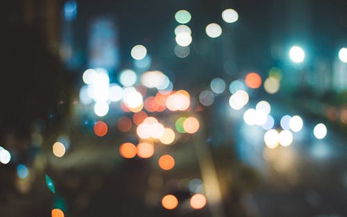 Bokeh Photography of City Lights at Night Time