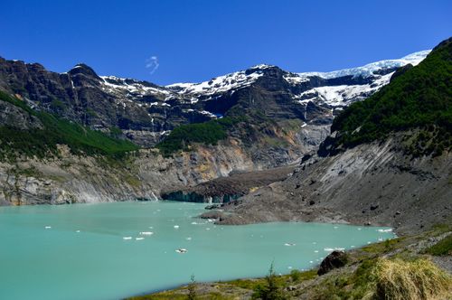 Free Spectacular Andean landscape with turquoise lake, snow-capped mountains in Bariloche, Argentina. Stock Photo