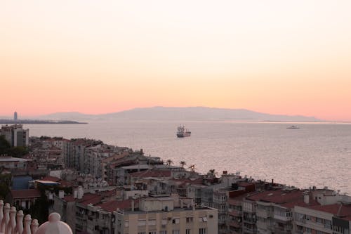 Photo of a Coastal City at Sunset 