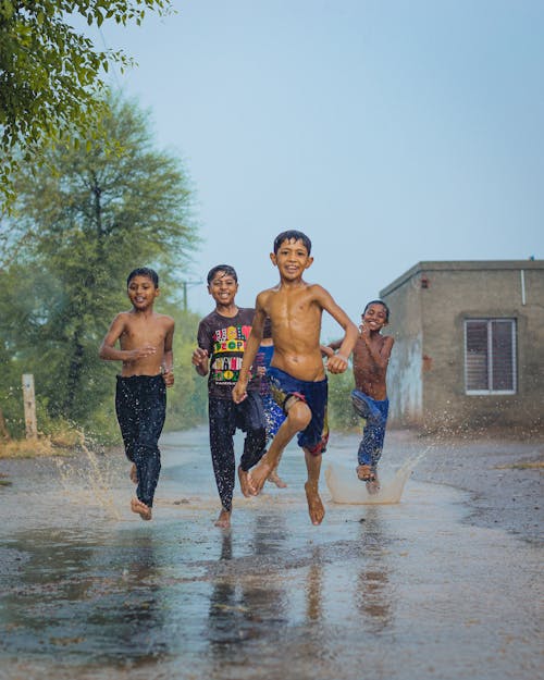 Boys Running in the Rain