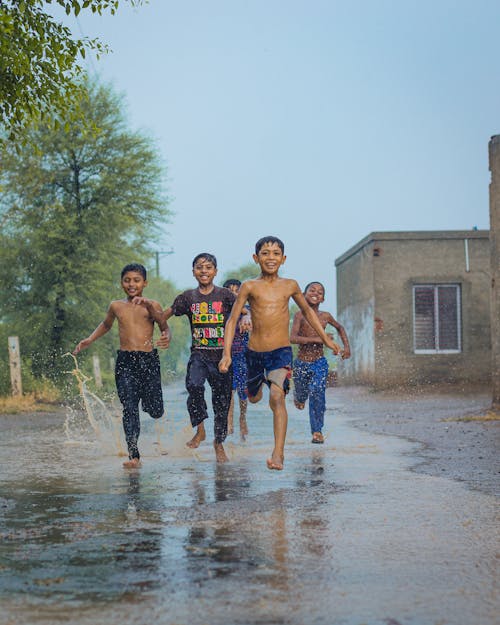 Children Running in the Rain 