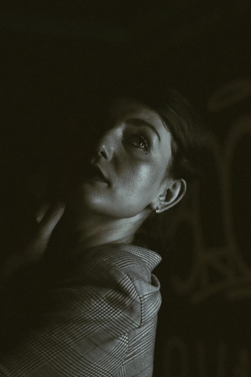 Free Moody black and white portrait of a woman in Jersey City. Stock Photo