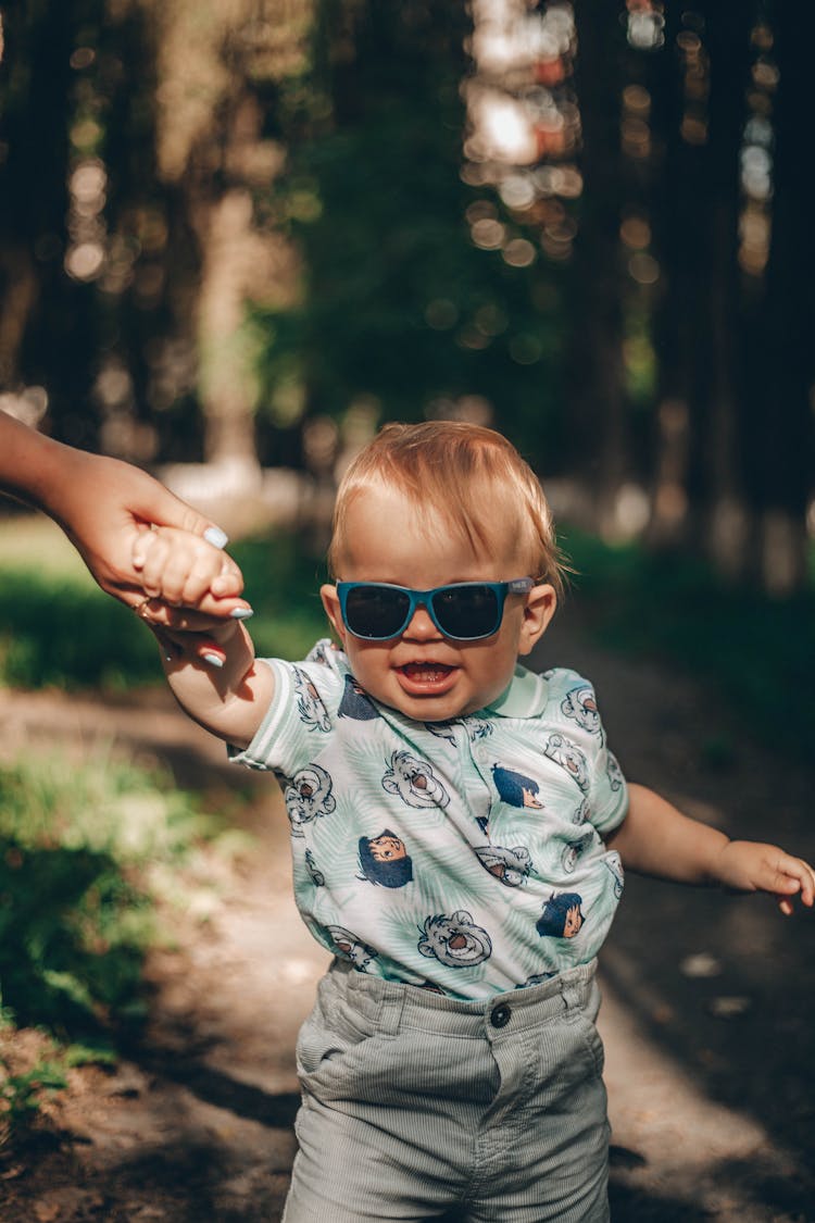 A Toddler Wearing Sunglasses