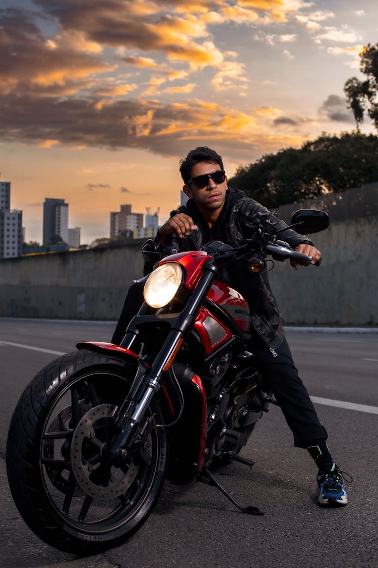 Portrait Of A Man With A Motorcycle