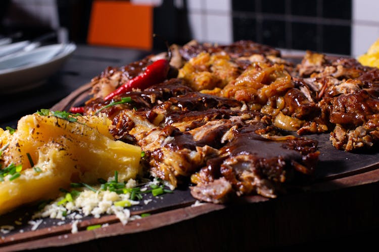 Cooked Food On Wooden Tray