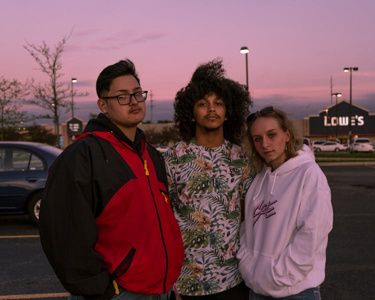 Photograph Of A Group Of Friends Posing Together