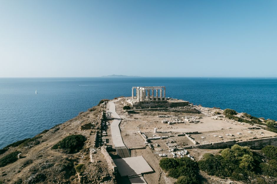 Best Private Helicopter Transfer from Crete to Santorini Review: The Ultimate Greek Island-Hopping Experience Review 2026 - Aerial shot of the ancient ruins by the sea, capturing the serene coastal beauty.