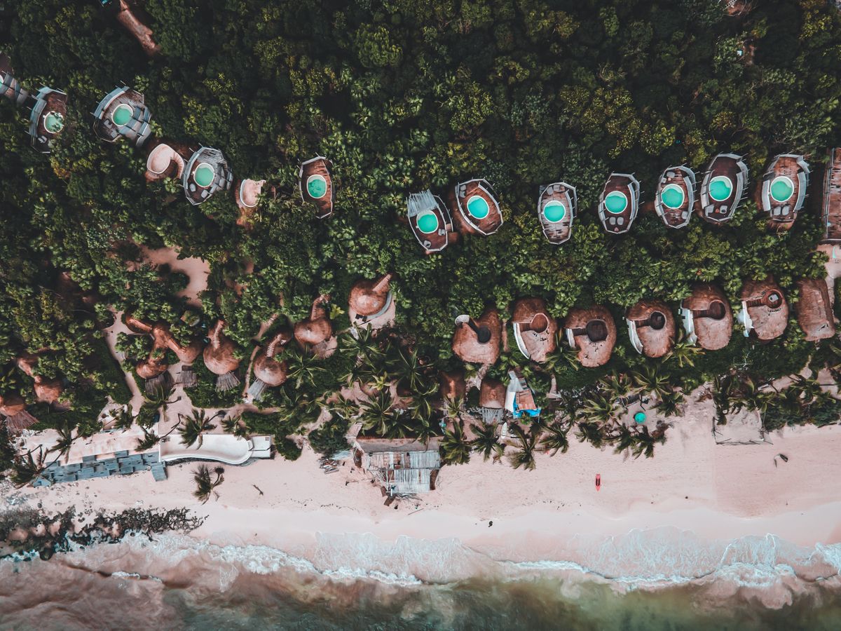 Aerial view of Tulum beach clubs at the jungle edge