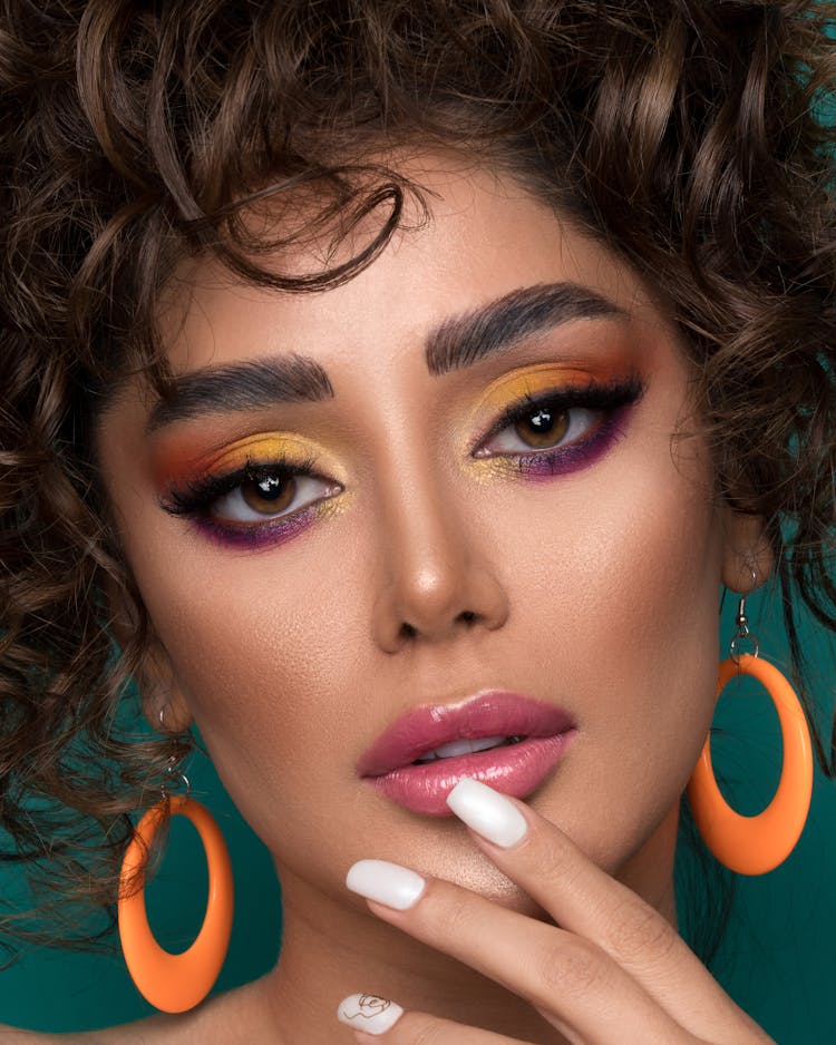 Beautiful Woman With Colorful Eye Makeup And Pink Lips