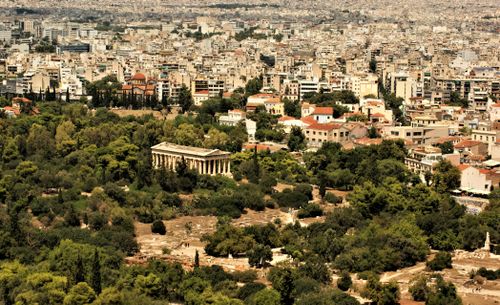 Free Aerial view showcasing the Ancient Agora and vibrant cityscape of Athens, Greece. Stock Photo