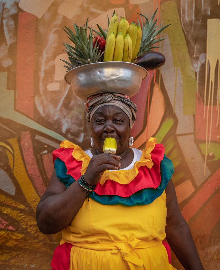 Fruit Seller Eating Ice Cream