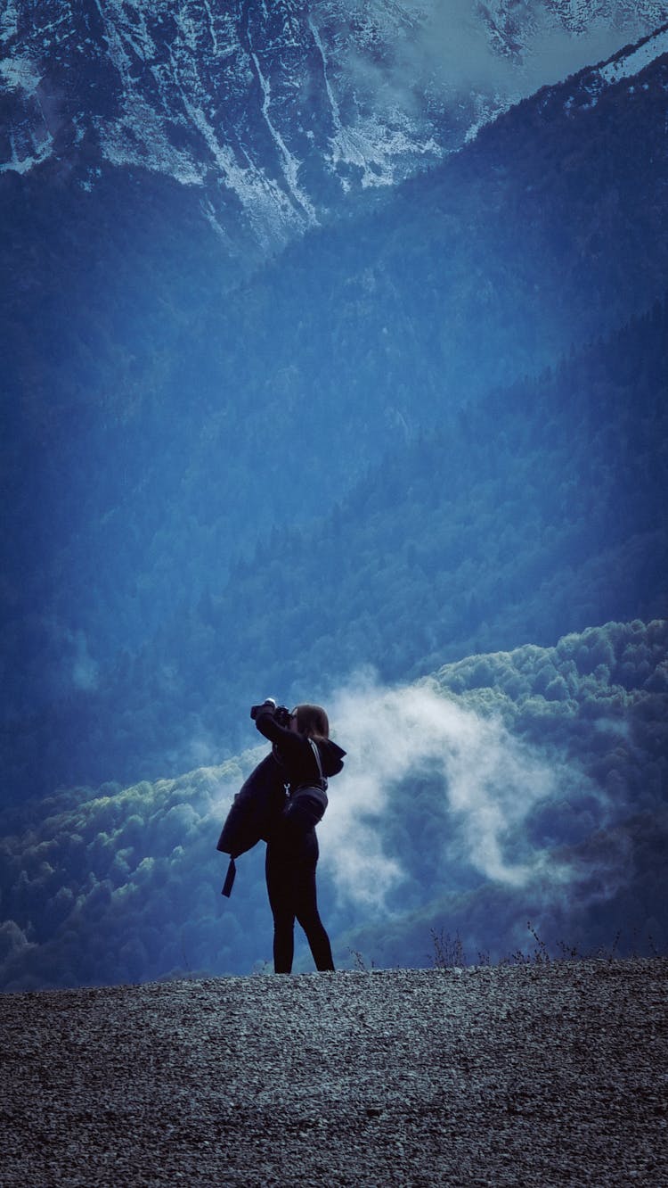 Photographer On Mountain