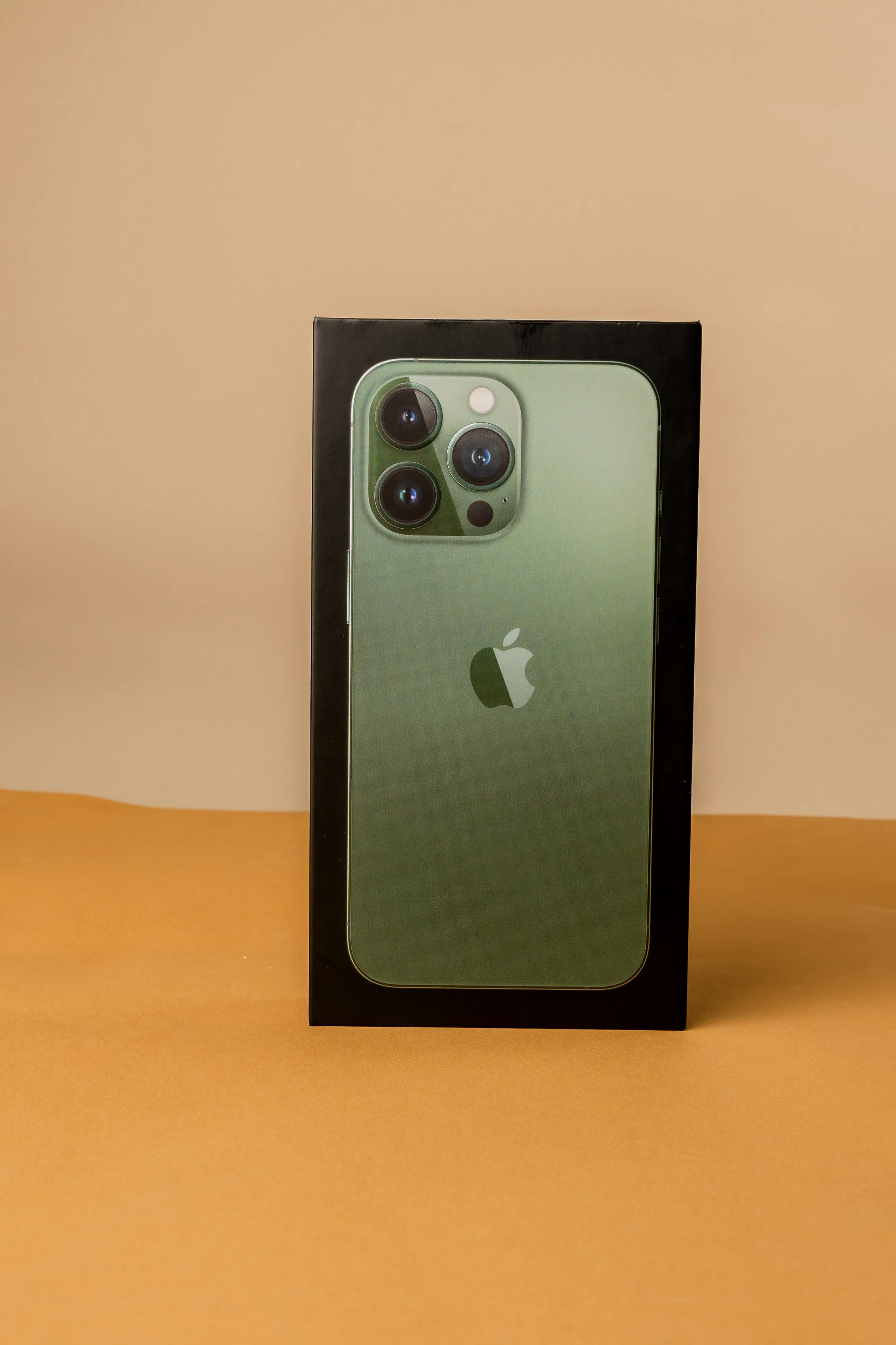 An Apple iPhone 13 Pro in a Box · Free Stock Photo