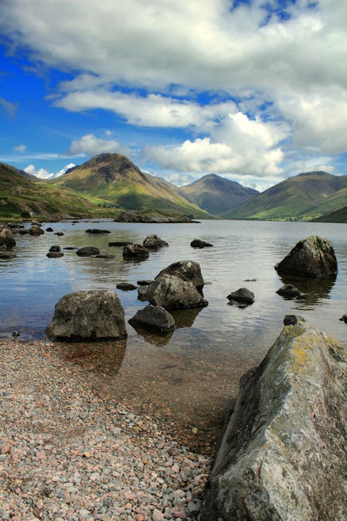 Mountain Surrounded With Body of Water