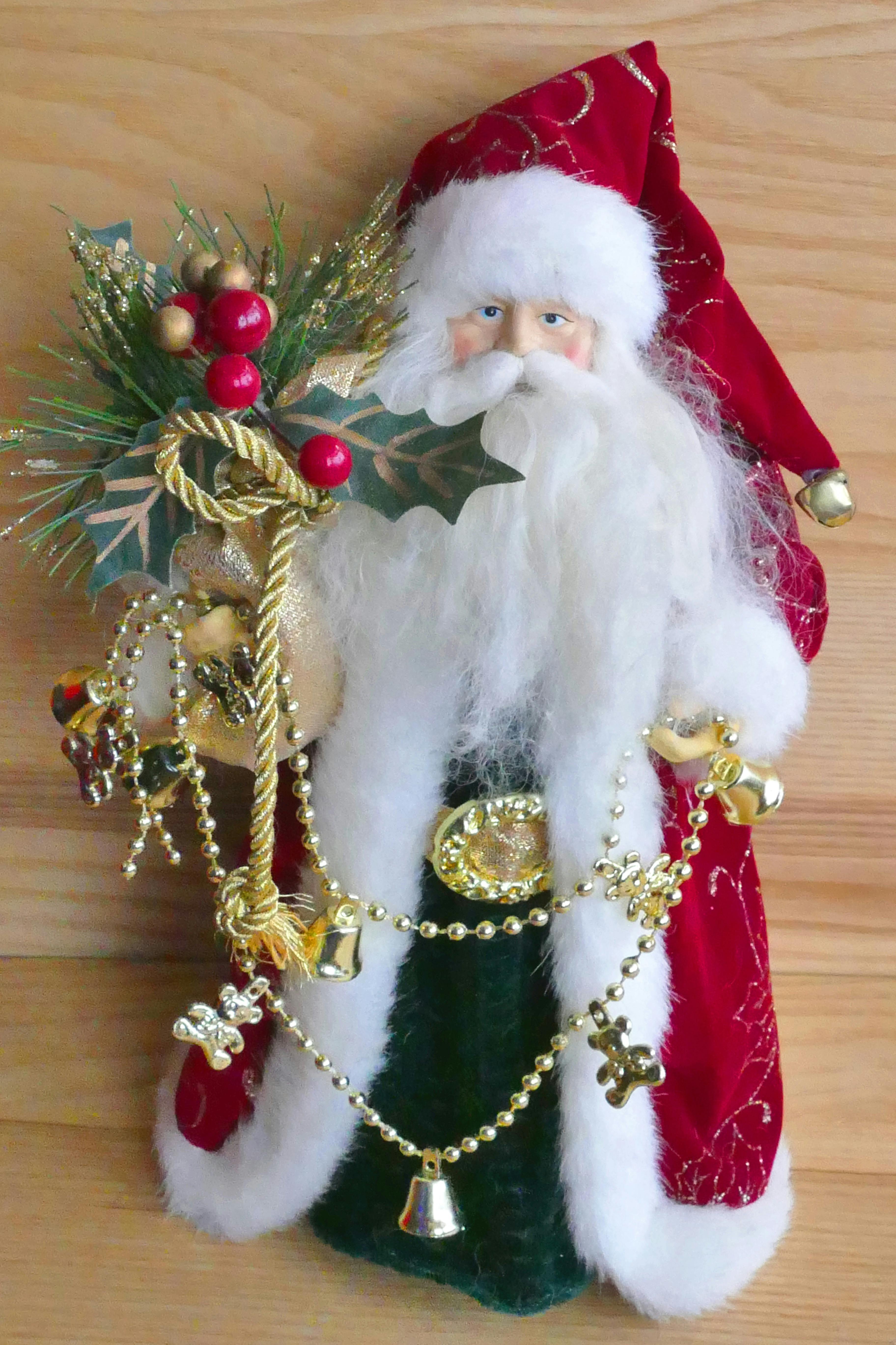 Santa Claus Holding Mistletoe Ornament Free Stock Photo