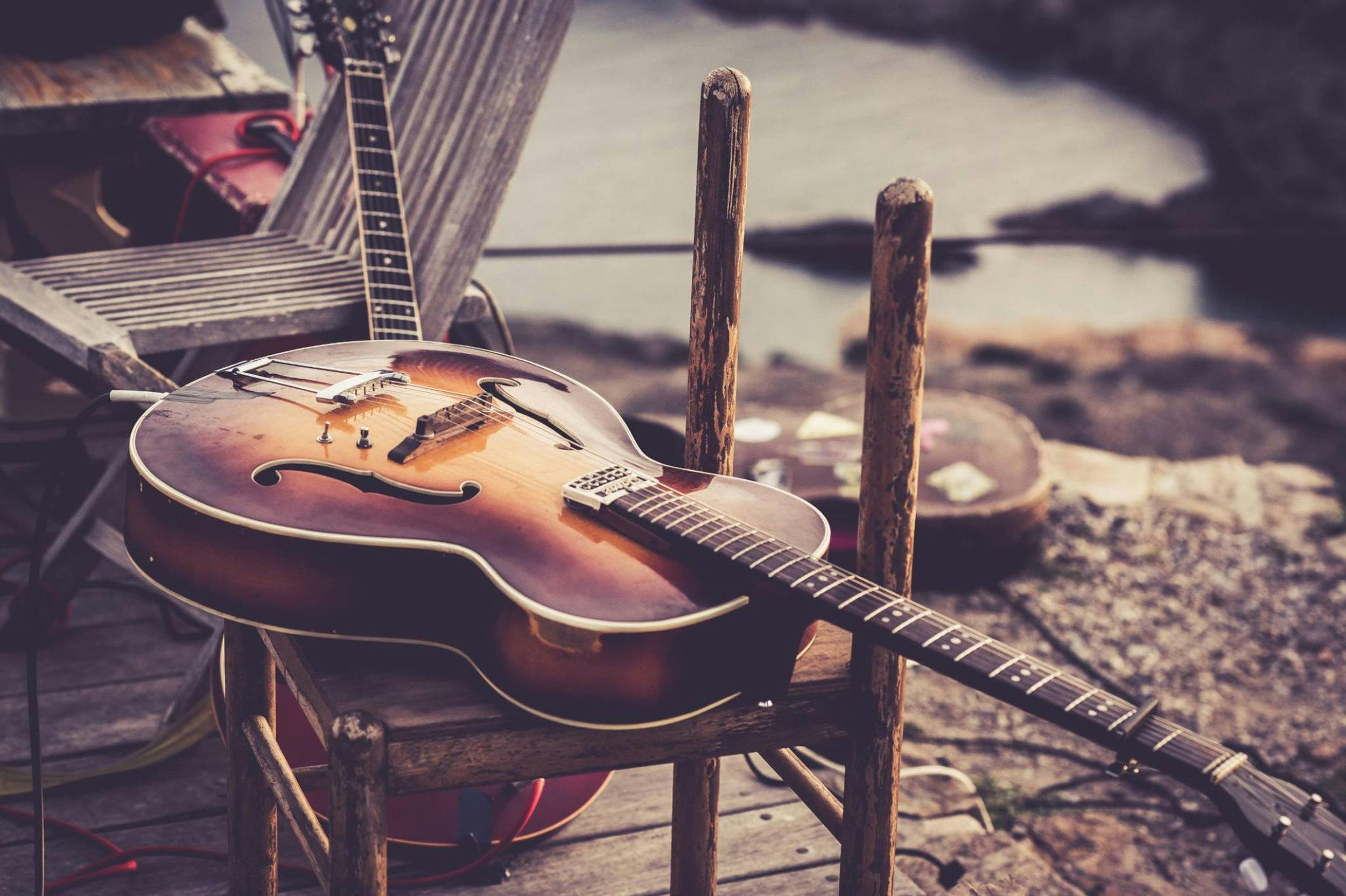 Classical guitar on the road, with nature background