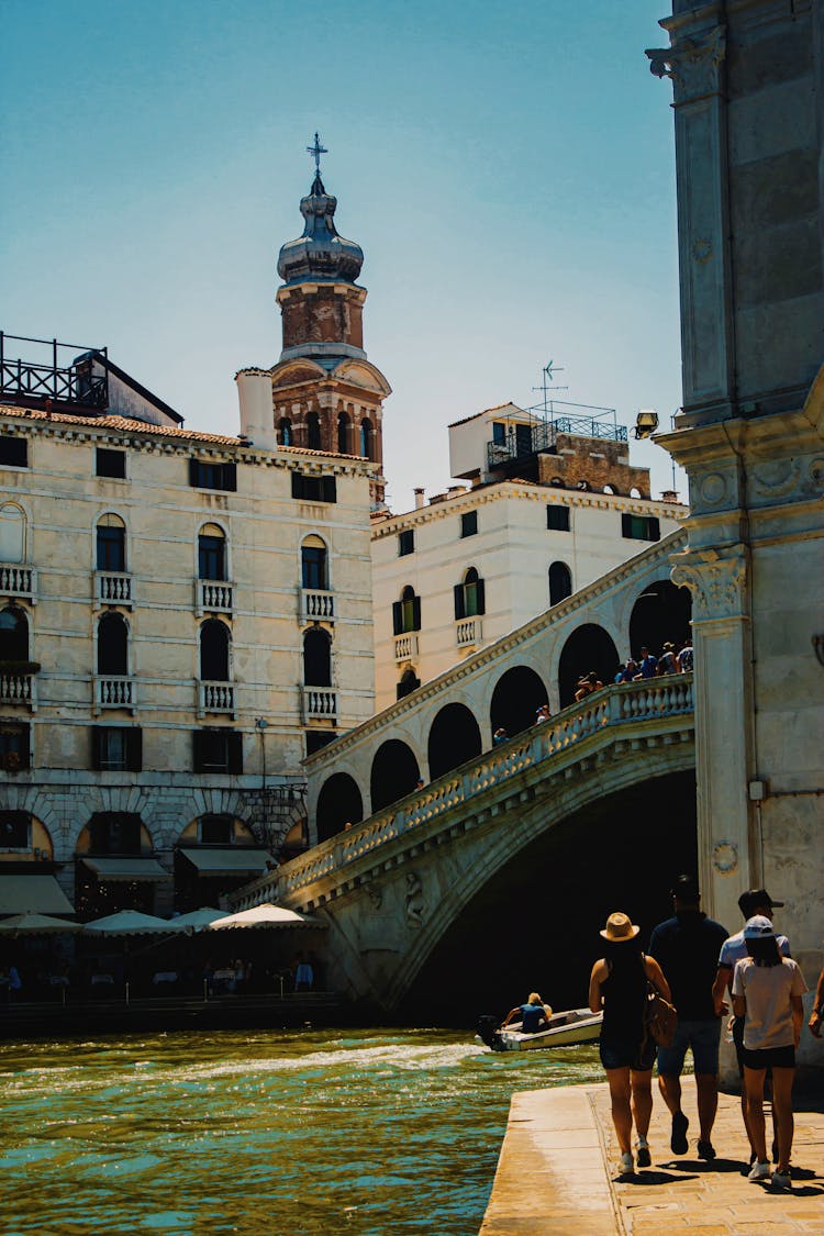 Tourists Enjoying And Sightseeing In Venice