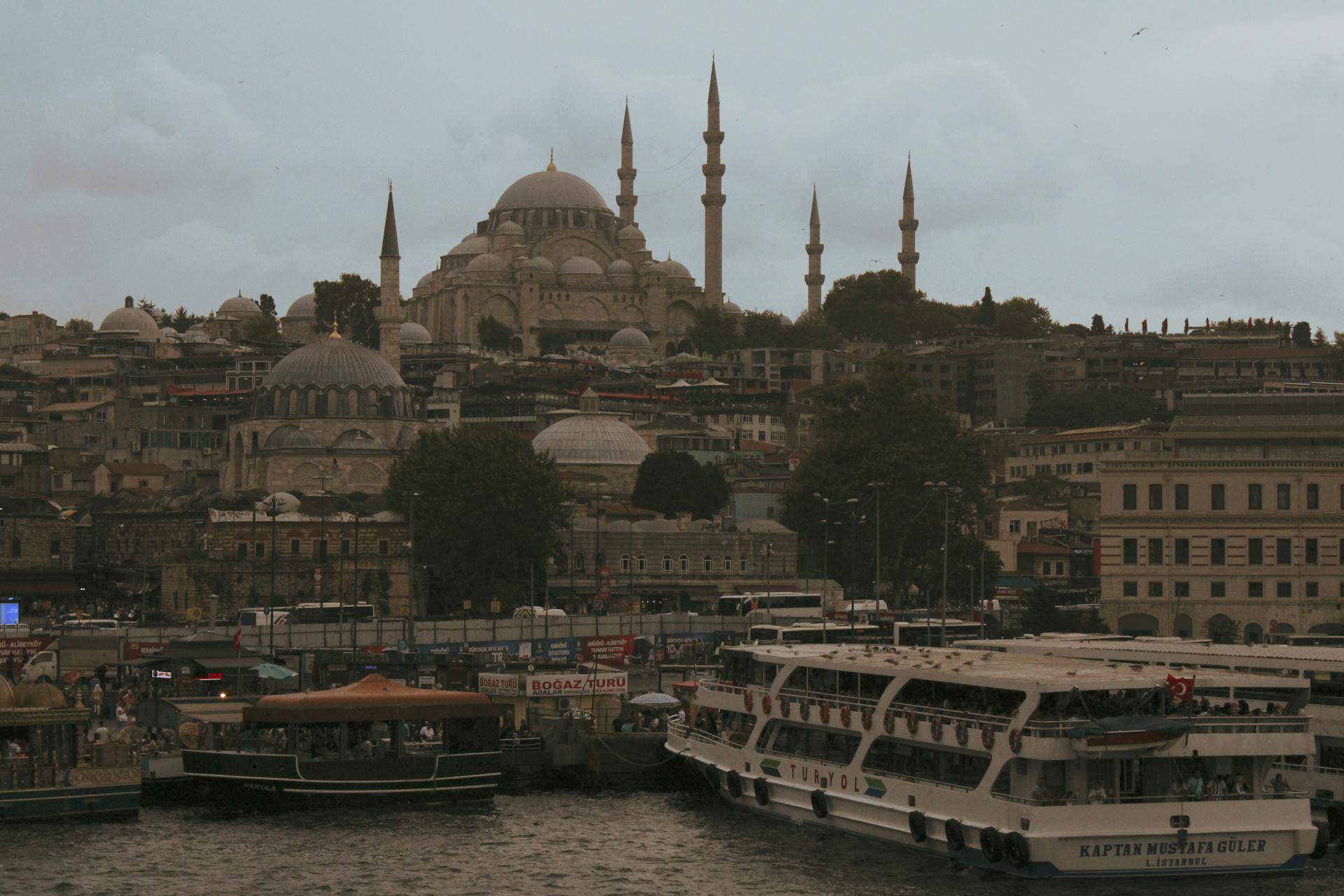 Scenic view of Suleymaniye Mosque with ferry boats on the Bosphorus, Istanbul.