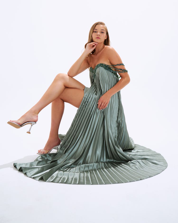 Model In Designer Dress Posing In Studio